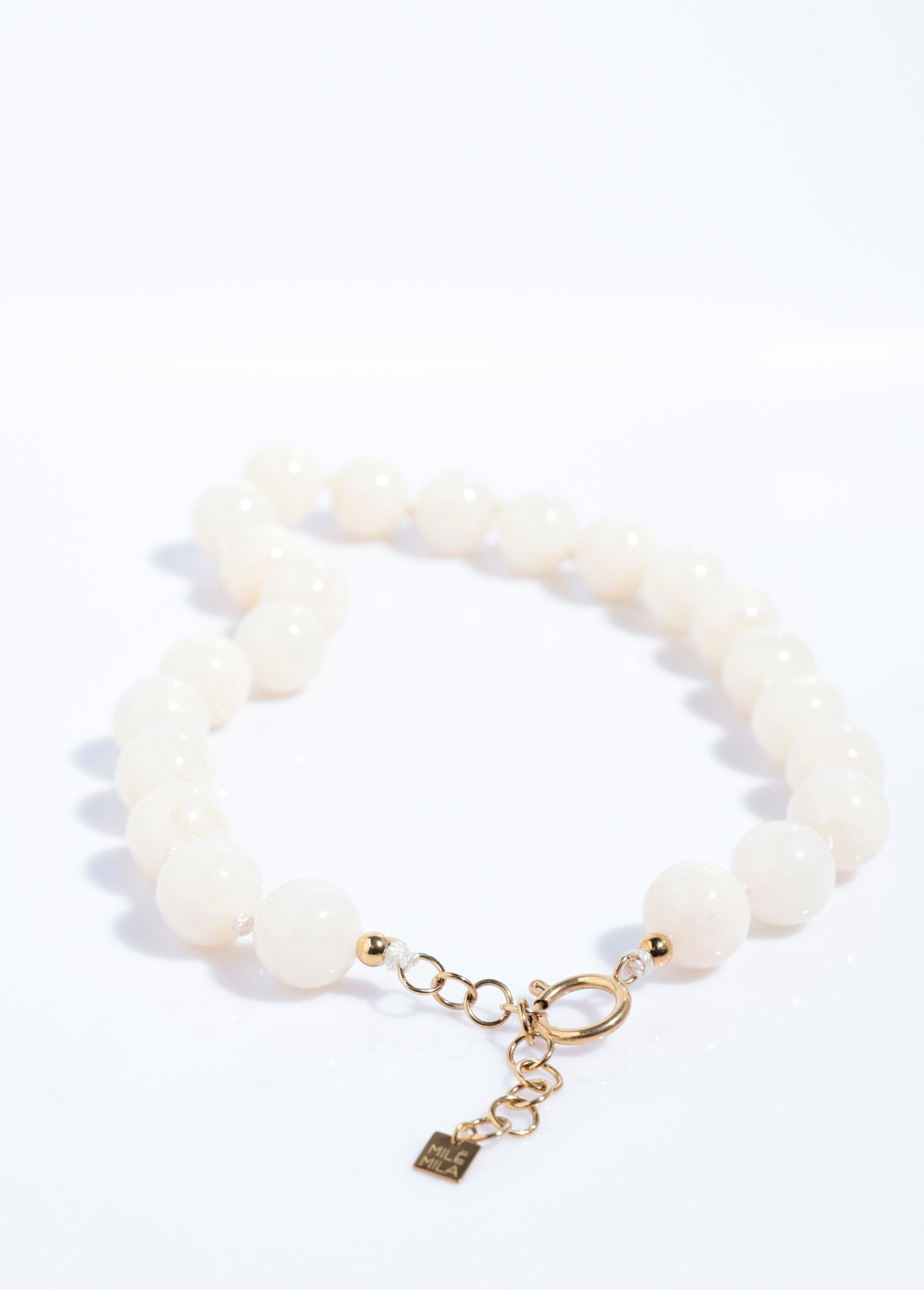 Collar_corto_con_cuentas_redondas_jaspeadas_Marfil_DE2_slim