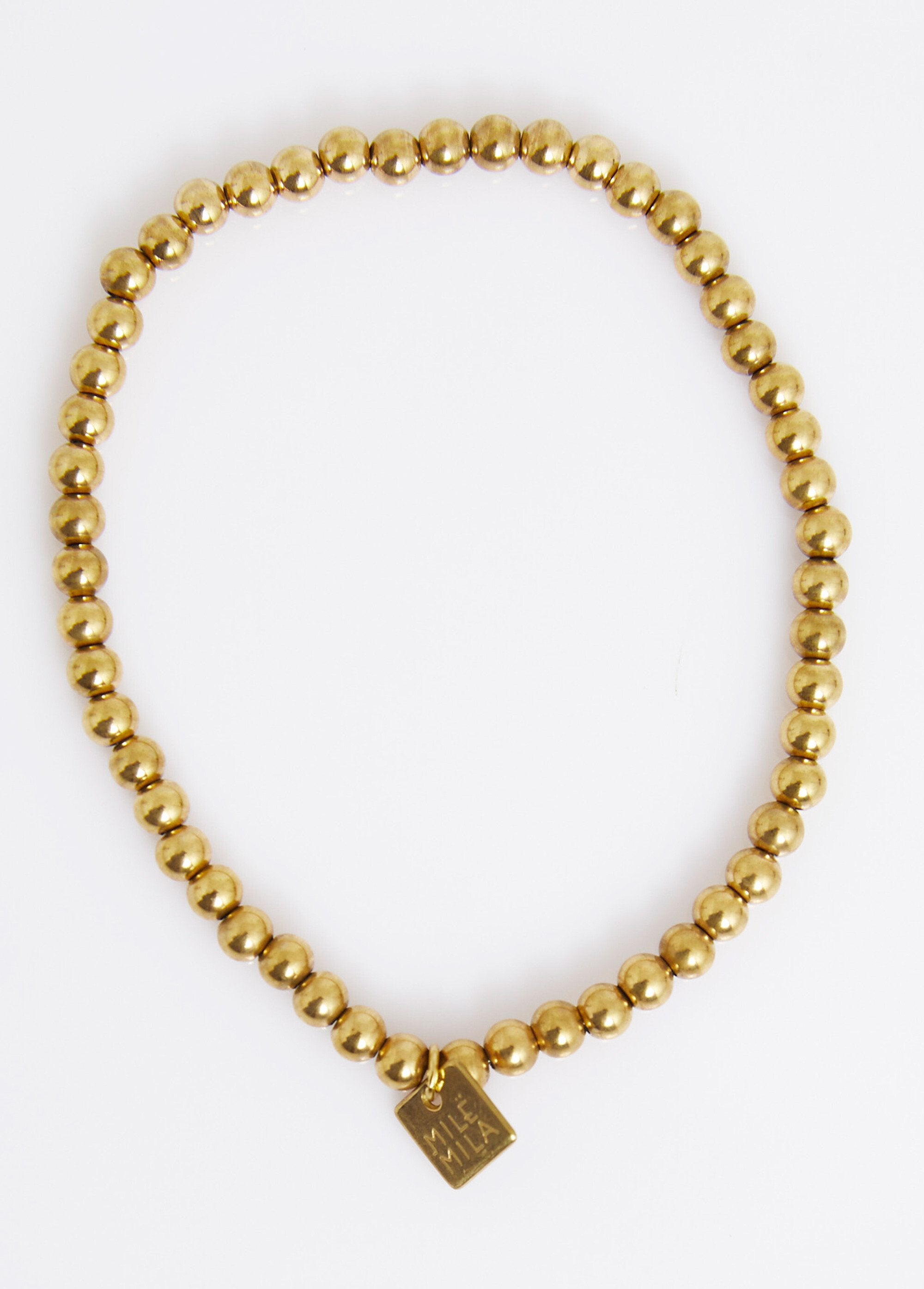 Pulsera_elástica_con_bolas_de_cuentas,_acero._Dorado_FA1_slim