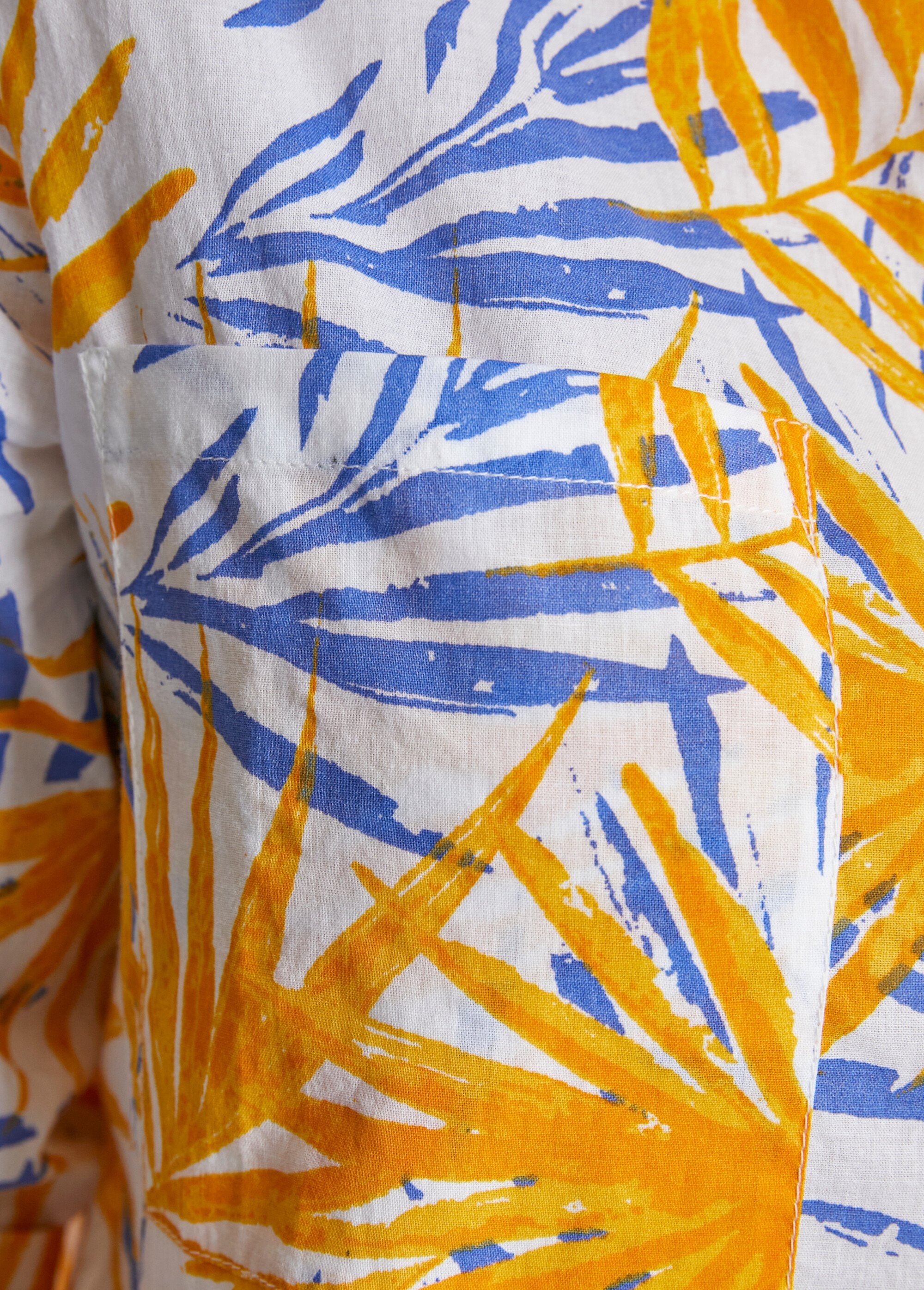 Blusa_larga_de_algodón_estampada_con_botones_Estampado_amarillo_DE2_slim