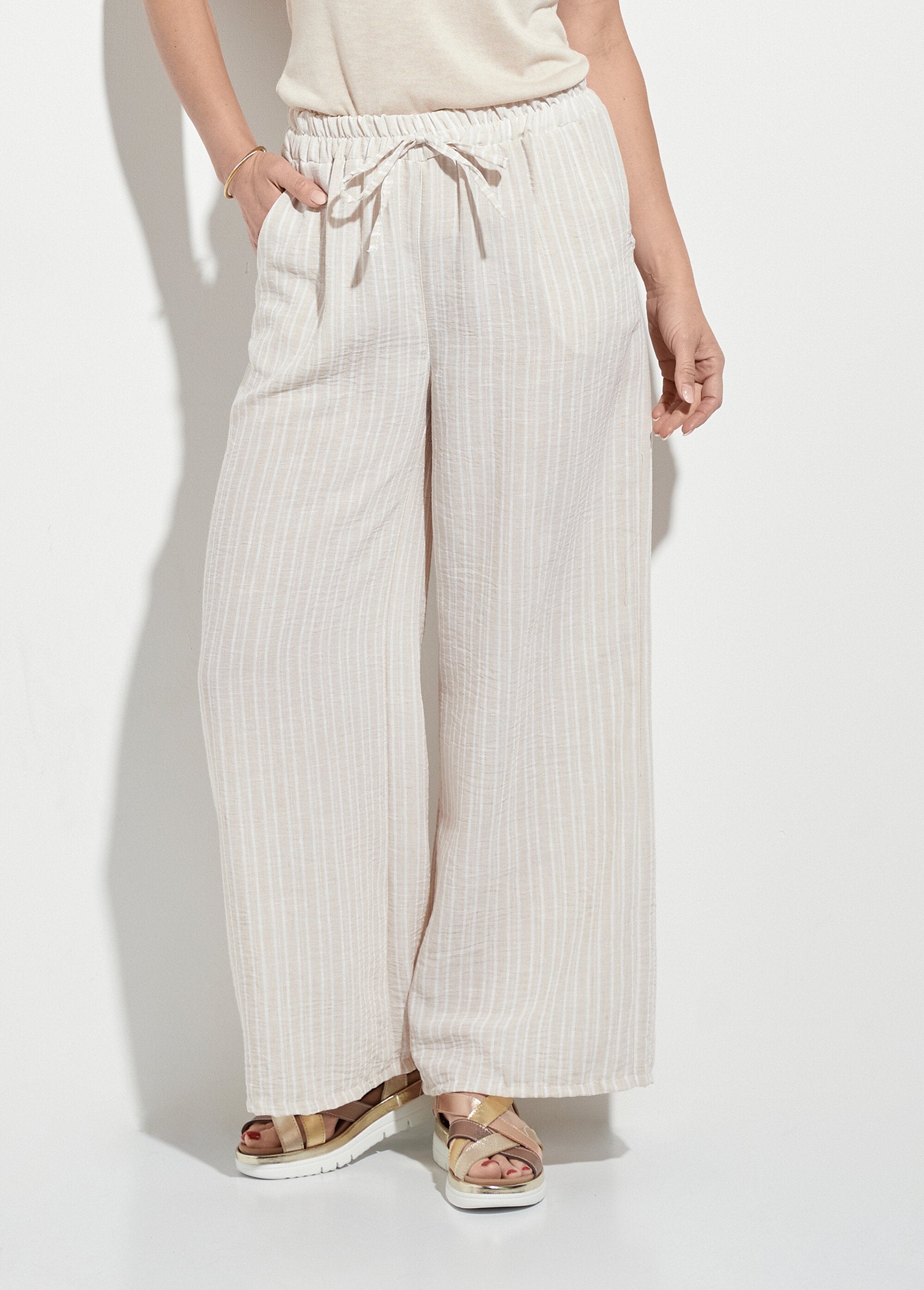 Pantalones_holgados_de_lino_a_rayas_Beige_FA1_slim