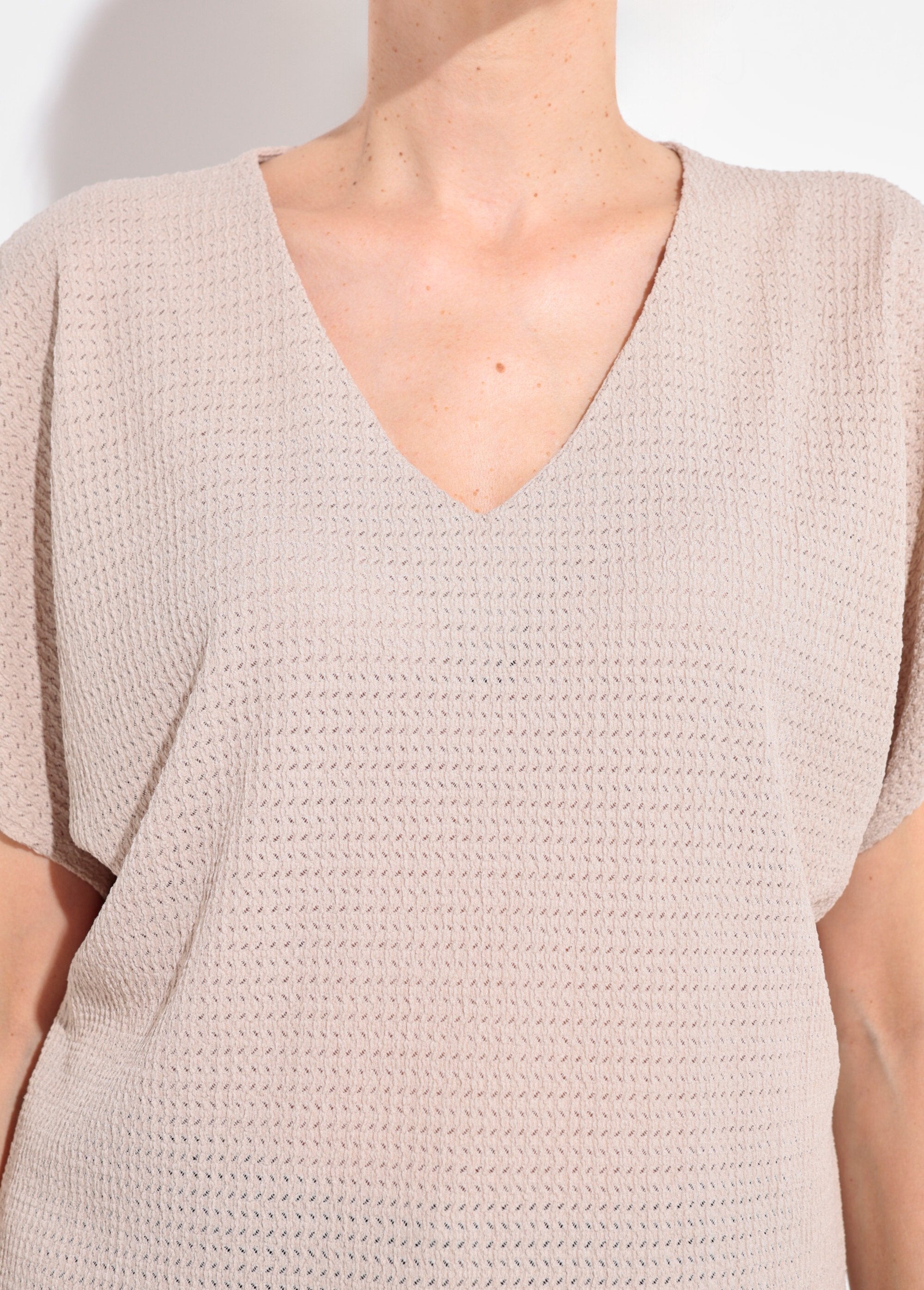 Camiseta_texturizada_con_mangas_elásticas_Cadena_DE1_slim
